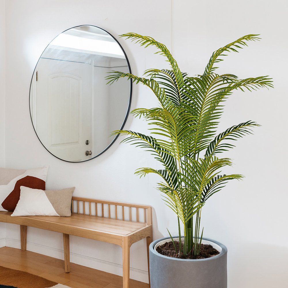 artificial-areca-palm-tree-indoor-lifestyle-decor Artificial areca palm tree in a modern interior setting with a large round mirror and wooden bench